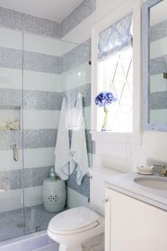 
                    
                        love these striped tiled walls  no money for tile? spruce up with paint in part of the bath with horizontal stripes
                    
                