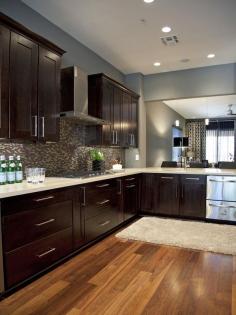 Espresso cabinets and grey walls from HGTV Design Star Britany's portfolio. LOVE everything but the back splash.
