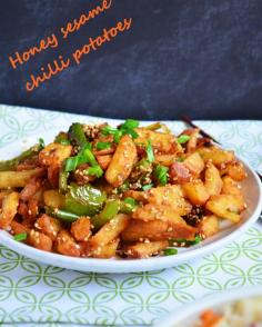 
                    
                        Sesame honey chilli potatoes recipe: Sweet and spicy indo chinese starter/side dish recipe with sesame seeds for added crunch,easy step wise recipe!  Recipe @ cookclickndevour.... #cookclickndevour #streetfood #potato #recipeoftheday
                    
                