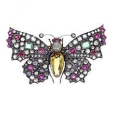 
                    
                        Late Victorian Topaz Fancy Diamond Emerald and Ruby Butterfly Brooch
                    
                