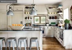 My dream kitchen, except I want a more eco-friendly/green feel. I love the open shelving, white cabinets, dark hardware, and rustic flooring.