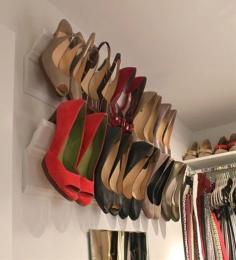 
                    
                        DIY Heel Wall Mount - Crown moulding angled just right against a piece of base molding will hold your heels up and out of the way.
                    
                
