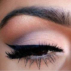 Soft eye makeup with winged eyeliner