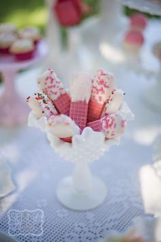 Treat at Lila's tea party - pink wafers dipped in white chocolate, garnished with sprinkles, great snack for girls' tea party