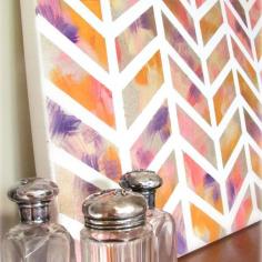 DIY Wall Art Measure where you want your white stripes to be on canvas. Using making or painters tape, mask out your design Chevron Design. Spray with gold spray paint.  Acrylic paints. Then layer the color onto the canvas. Use different colors. Then let it dry.