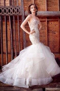 
                    
                        Beaded and embroidered fit and flare tulle wedding dress. Click to view the full Lazaro Fall 2015 bridal collection: www.colincowiewed...
                    
                