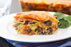 
                    
                        Stacked Roasted Vegetable Enchilada Recipe on twopeasndtheirpod... Easy to make and freezes well too!
                    
                