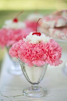 These carnation "sundae" centerpieces would be adorable at a Sweet Sixteen or an ice cream birthday party for younger kids.