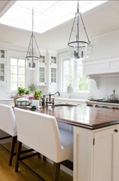 White Kitchen. Traditional white kitchen with off-white cabinets, butcher's block countertop, classic white subway tiles. #Kitchen #WhiteKitchen #TraditionalKitchen  2 Ivy Lane.  note - counter profile - F & V ogee?