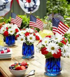 4th of July decorating...color your water with blue food coloring, add red carnations and white daisies / simple and pretty...great idea for any occasion