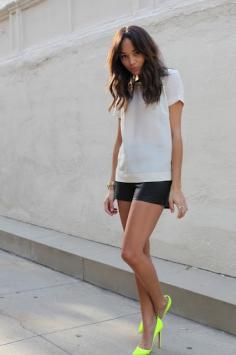 Ashley Madekwe Leather Shorts and Neon shoes