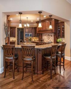 This gourmet kitchen features a bar that comfortably seats four! The Jasper Hill - 5020. http://www.dongardner.com/plan_details.aspx?pid=4229. #Gourmet #Kitchen #Home