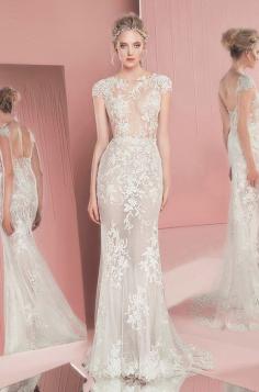 
                    
                        Zuhair Murad Spring 2016 lace embroidery white sheath wedding dress with cap sleeves.
                    
                