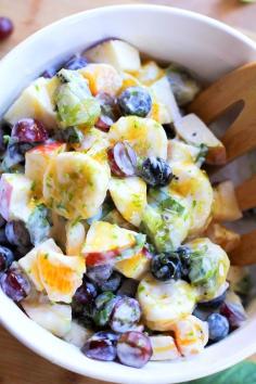 
                    
                        Healthy Zesty Fruit Salad with Coconut Milk and Basil - decadent enough for dessert, made coconut milk and honey | theroastedroot.net #healthy #recipe #dairyfree #coconutmilk
                    
                