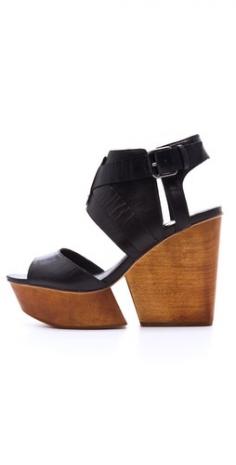 Wedges with unexpected cutouts give your ensemble a creative twist.