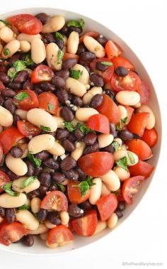 
                    
                        White and Black Bean Salad Recipe with Tomatoes, Basil and Garlic shewearsmanyhats.com
                    
                