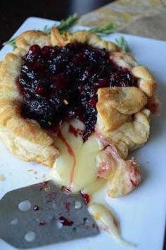 Baked brie with balsamic rosemary cranberry sauce looks like a delicious Christmas appetizer!