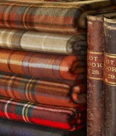 Use tartan fabrics folded next to old books for easy shelf decoration.