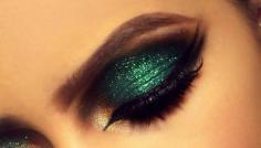Glittery green makeup...