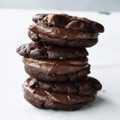 Triple-threat Chocolate Cookies Recipe | myrecipes.com ~ Prepare to abandon all restraint when you try one of these cookies, made with melted chocolate and chocolate chips in the batter and layered with a chocolate ganache filling.