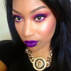 Rich purple lips on dark skin.