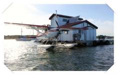 
                    
                        floating home with seaplane
                    
                