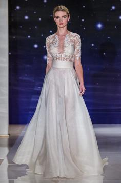 
                    
                        This romantic wedding dress features embroidered illusion bodice. Reem Acra, Spring 2016
                    
                
