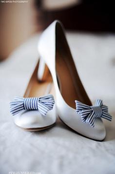Update the "something blue" tradition with a small touch in one of your signature wedding day pieces. Check out these white heels with blue striped bows