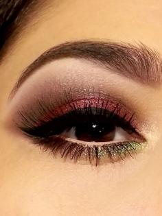 A gorgeous eye makeup idea: Pink  green shimmer with a black winged eye. For bright  beautiful makeup, visit Walgreens.com.