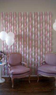 Hang and twirl streamers to create a pretty picture backdrop for a shower or a birthday party! ... If we did a photo theme party this could be fun instead of a photo booth!