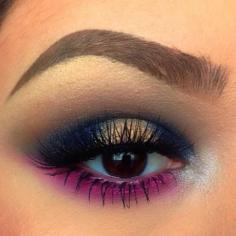 Gold, black, blue, and pink eyeshadow.