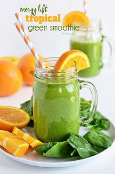 
                    
                        This Energy Lift Tropical Green Smoothie is full of fresh fruits and dark leafy greens that provide energy and a fast healthy meal that actually tastes good. Recipe at TidyMom.net #backtocollege
                    
                