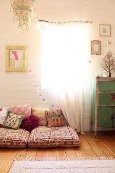 perfek little girls room. (not that i need one). Love the morrocan textiles and tree branch curtain rod.. and vintage dresser.. and frames.. and tree...