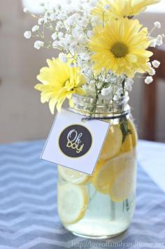 Gray & Yellow Baby Shower Decorating Ideas. Easy centerpieces with lemon slices, baby's breath, & yellow mum daisies. Cheap, easy, & beautiful.  Or just flowers as the center pieces.