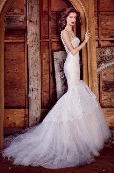 
                    
                        Ivory/Silver Chantilly lace fit and flare wedding dress with cashmere underlay, opal jeweled chandelier necklace accents sweetheart neckline and plunging U back. Lazaro, Fall 2015
                    
                