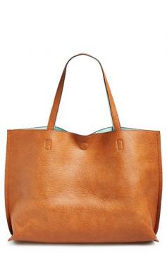 Free shipping and returns on Street Level Reversible Vegan Leather Tote & Wristlet at Nordstrom.com. Colored faux leather flips inside-out for a reversible tote with unlimited styling options. A matching wristlet furthers the versatility and completes the look.
