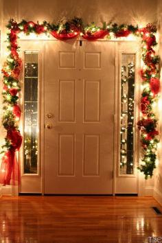 Front door decorating inside during the Holidays  Christmas decorating is ...well... AWESOME!