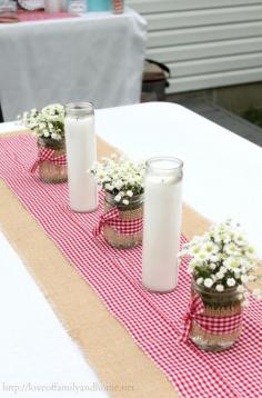 Main idea here is the color fabric over the burlap - different candles and arrangements though..