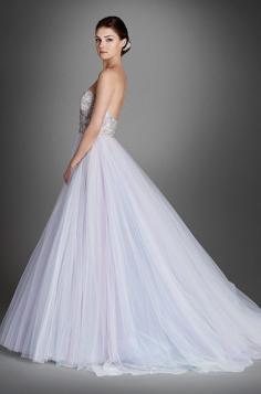 
                    
                        Love this pastel purple color ball gown wedding dress by Lazaro? You need see the front!
                    
                