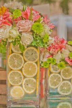 A Pink Lemonade Garden Party Centerpiece - what a pretty theme idea! Maybe for the bridal shower???