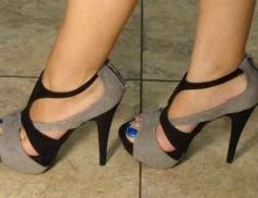 Black and grey strap heels. Blue nail polish. Soft elegant look. Women walk on!
