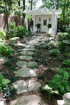 Tiny house in a  secret garden and flagstone path. ♥