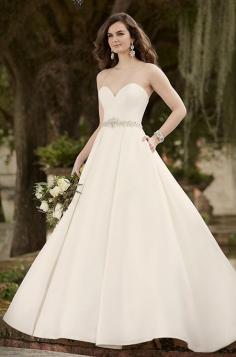 
                    
                        Simple elegant strapless ball gown wedding dress by Essense of Australia, Fall 2015
                    
                