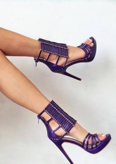 Hot damn these are sexy purple strappy-glatior-like high heel sandals!! Purple High Heels. www.misskrizia.com