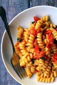 Pasta with slow-roasted cherry tomatoes and cream is rich and indulgent with bursts of juicy tartness from the roasted tomatoes.