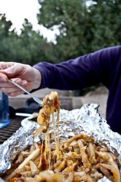 Camping food- Yummy Chili Cheese Fries! Prepare ahead of time in foil. Highly recommend if you are looking for a no mess, yummy treat around the campfire!