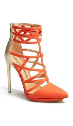 Gorgeous heels for the holidays. Coral orange cage high heel shoes