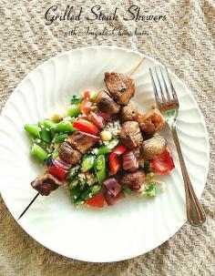 
                    
                        Grilled Steak Skewers with Arugula Chimichurri | www.takingonmagaz... | These gloriously spiced Grilled Steak Skewers are awesome on their own, but twice as delicious with the Arugula Chimichurri.
                    
                