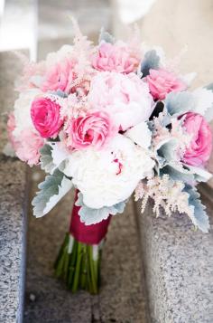 
                    
                        Pink tonal blooms and dusty miller make this one fabulous bridal bouquet.
                    
                