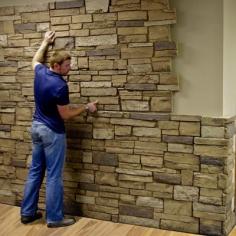 Faux stone sheets! Great idea for a basement accent wall / or FOR BAR AREA
